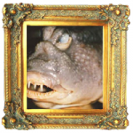 picture of a very ugly fish in an elaborate gilded frame